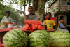 New Delhi, India: watermelon vendor - fruit and burning incense - street life in the Old city - photo by G.Koelman