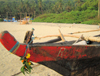 Goa, India: Arambol Beach - flower decorated prow of a Goan outrigger fishing boat (Vadem) - photo by R.Resende