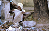 India - Goa: homeless man searches in the garbage - SDF / Obdachloser - photo by W.Allgwer