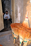 Iran - Shiraz: selling brooms - photo by M.Torres
