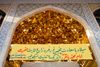 Iran - Shiraz: Shah-e-Cheragh mausoleum - golden muqarnas over the main gate - photo by M.Torres