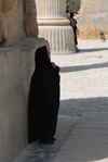 Iran - Persepolis:  Gate of all the nations - an Iranian woman contemplates the work of her Aryan ancestors - wimple - photo by M.Torres