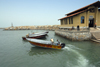 Iran - Hormuz island / Jazireh-ye Hormoz: speedboats to Bandar Abbas and their terminal - photo by M.Torres