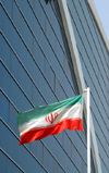Iran -  Bandar Abbas: Iranian flag and Setareh e Jonub Business and Recreational Center - photo by M.Torres