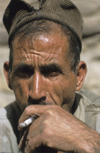 Iran: man smoking - photo by W.Allgower