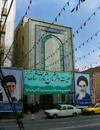 Tabriz - East Azerbaijan, Iran: tiled faade flanked by Grand Ayatollahs Khamenei and Khomeini - photo by N.Mahmudova