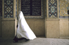 Iran: woman in a white chador - a sign of mourning - photo by W.Allgower