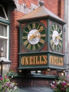 Ireland - Dublin: O'Neils pub - clock detail (photo by R.Wallace)