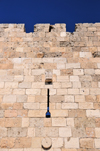 Jerusalem, Israel: west side of the city walls - arrowslit - Six-Day War bullets left pockmarks in the wall - photo by M.Torres