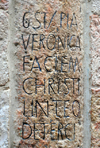 Jerusalem, Israel: Via Dolorosa -  Station 6 - dedicated to the woman, St. Veronica, who wiped Jesus face - Latin inscription 'Pia Veronica faciem christi linteo deterci', 'pious Veronica wiped the face of Christ with a cloth' - photo by M.Torres