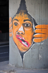 Tel Aviv, Israel:  face with twisted mouth - graffiti on Eliezer Peri Street, below Colosseum Nightclub - photo by M.Torres