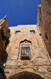 Jerusalem, Israel: stone arch and window over El Wad Ha Gai street - Muslim Quarter - photo by M.Torres