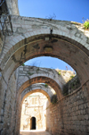 Jerusalem, Israel: stone masonry arches on Saint James Street - Armenian quarter - photo by M.Torres