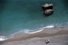 Italy / Italia - Amalfi (Campania): sunbathers on a tranquil beach (photo by M.Gunselman)