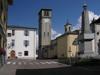 Italy - Teglio, Sondrio province, Lombardy: obelisk and church tower - photo by J.Kaman