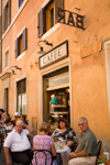Rome, Italy: people sitting outside a cafe - photo by I.Middleton