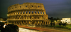 Italy - Rome, Lazio: Colosseum and Via dei Fori Imperiali at night - photo by W.Allgower