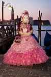 Carnival participant with Carnival costume at Dawn by Canale di San Marco, Venice - photo by A.Beaton