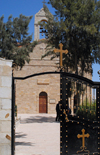 Madaba - Jordan: gate - Greek Orthodox Church of St. George / Agios Giorgios - photo by M.Torres