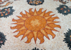 Madaba - Jordan: modern mosaic with the sun - photo by M.Torres