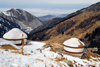 Kazakhstan - Chimbulak ski-resort, Almaty: yurts and the Alatau Mountains - photo by M.Torres