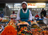 Kazakhstan, Almaty:green market, or Zelyoni Bazaar - woman selling Korean salads - photo by M.Torres
