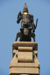Kazakhstan, Almaty: Republic square - Independence Monument - Golden Warrior on a snow leopard's back - photo by M.Torres