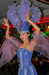 Kazakhstan, Almaty: exotic cabaret dancer with plumes - photo by M.Torres