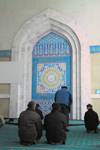 Kazakhstan, Almaty: Central Mosque - men praying - photo by M.Torres