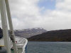 Kerguelen island - TAAF: November - patches of snow remain at the higher elevations - view from the Akademik Shokalskiy (photo by Francis Lynch)