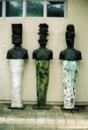 Asia - South Korea - three figures - modern sculptures on the street - photo by S.Lapides