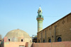 Erbil / Hewler, Kurdistan, Iraq: Erbil Citadel - Mulla Afandi Mosque minaret with intricate tile decoration and the large dome of the citadel baths (hammam Qala) -  located at the main road crossing the center of the Citadel from South to North - Qelay Hewlr - UNESCO world heritage site - photo by M.Torres