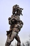 Bishkek, Kyrgyzstan: a man carries his horse - statue at the Palace of Sports - Togolok Moldo street - photo by M.Torres