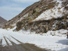Kyrgyzstan - Chuy oblast: mountain road with snow - winter scene - Central Asian climate - photo by D.Ediev