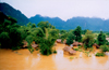 Laos - Vang Vieng - the effects of the monsoon - Nam Song river enters a village - photo by K.Strobel