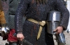 Latvia - Ventspils: hand on sword, helm and coat of mail - medieval festival (photo by A.Dnieprowsky)