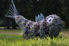 Latvia - Ventspils: like fish on grass? - flower sculpture (photo by A.Dnieprowsky)