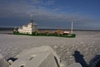 Latvia - Ventspils: the Dzelme breaks the ice to enter the harbour - freight ship - winter - BAltic sea (photo by A.Dnieprowsky)