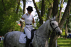 Latvia - Ventspils: a day at the races - Nadya rides a horse (photo by A.Dnieprowsky)
