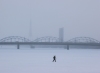 Latvia / Latvija / Lettland - Riga: frozen Daugava - fog and the rail bridge (photo by Alex Dnieprowsky)