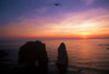 Lebanon / Liban - Beirut: Mediterranean sunset - Pigeon Rocks - silhouettes and aircraft - photo by J.Wreford