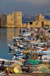 Lebanon, Sidon: fishing boats with view to the crusaders' sea castle - photo by J.Pemberton