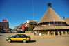 Maseru, Lesotho: Basotho Hat craft store - view of Kingsway with taxi entering - photo by M.Torres