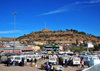 Maseru, Lesotho: minibus station - hill with large antenna - photo by M.Torres