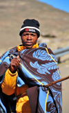 Mohale Dam, Lesotho: shepherd with blanket and woolen hat - photo by M.Torres