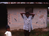 Grand Bassa County, Liberia, West Africa: kids and painted faade - photo by M.Sturges