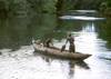 Grand Bassa County, Liberia, West Africa: crossing the Cola River - dugout canoe - photo by M.Sturges