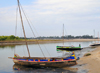 Morondava - Menabe, Toliara province, Madagascar: fishing boats rest in the harbour - Nosy Kely peninsula - photo by M.Torres