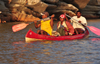 Antsalova district, Melaky region, Mahajanga province, Madagascar: Manambolo River - men paddling downstream - photo by M.Torres