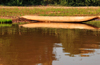 Antsalova district, Melaky region, Mahajanga province, Madagascar: dugout canoe reflected on the Manambolo River - photo by M.Torres